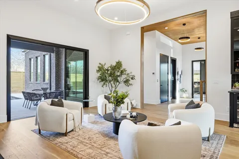 a kitchen with a refrigerator and a sink