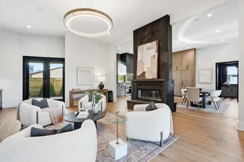 a bathroom with a sink toilet and mirror
