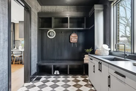 a bathroom with a glass door shower