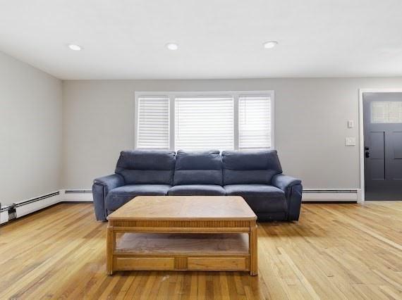 65 Gore Road Revere, MA 02151 - Photo 18 of 35 a living room with furniture and a wooden floor