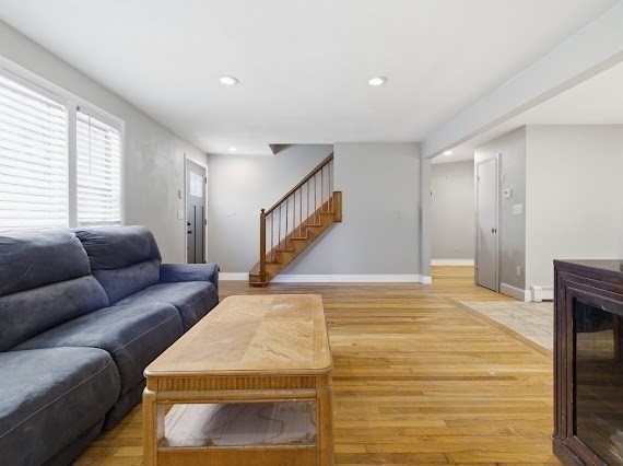 65 Gore Road Revere, MA 02151 - Photo 19 of 35 a living room with furniture and a fireplace