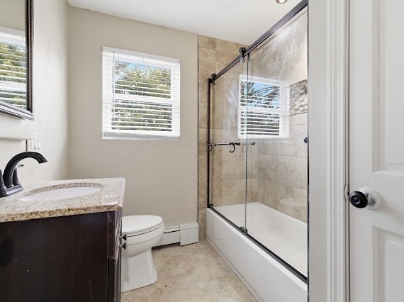 65 Gore Road Revere, MA 02151 - Photo 24 of 35 a bathroom with a granite countertop sink a toilet and shower
