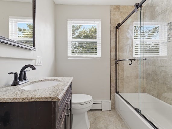 65 Gore Road Revere, MA 02151 - Photo 25 of 35 a bathroom with a granite countertop sink a toilet and a bathtub