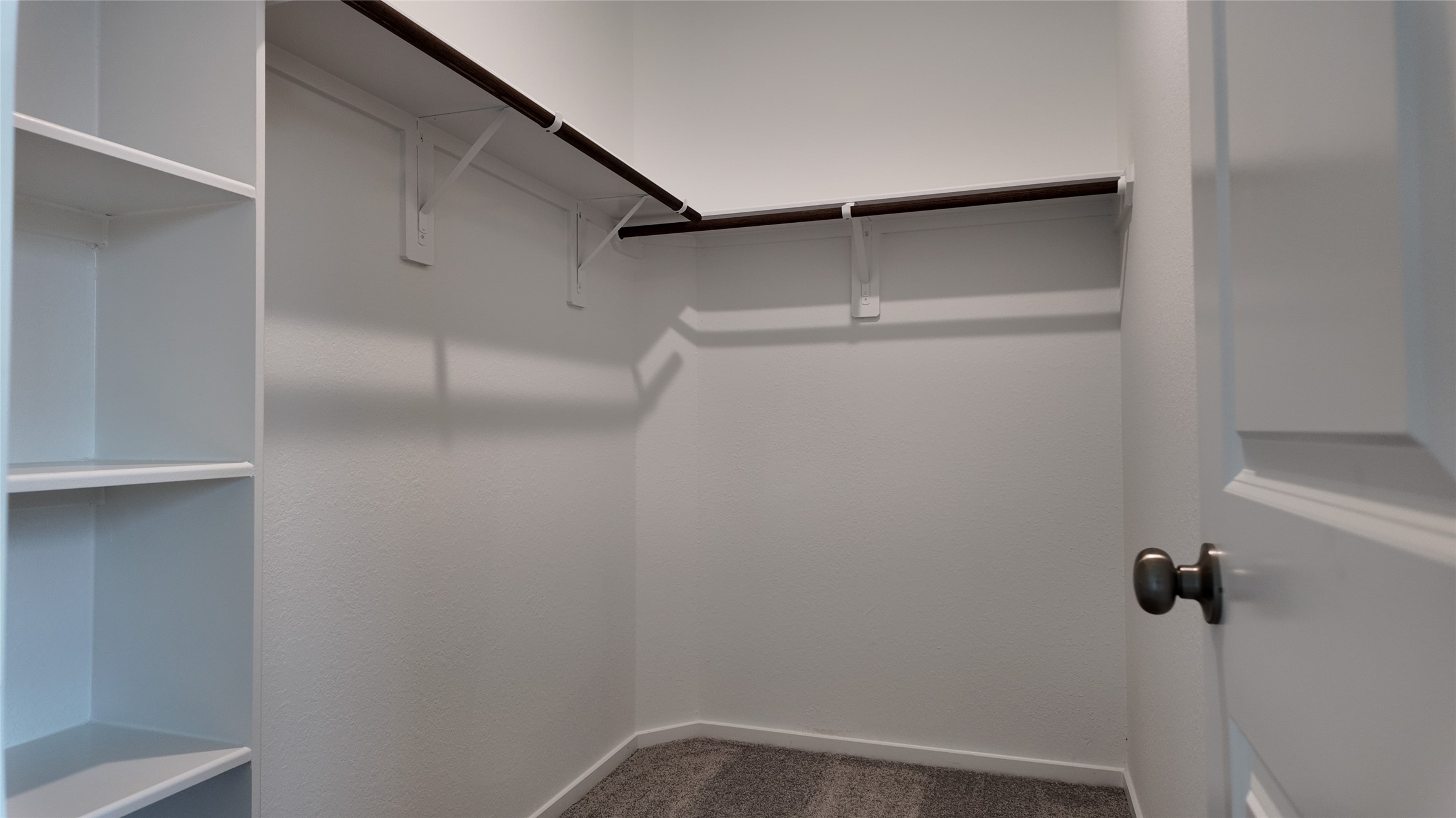 15023 Rustic Moon Road Conroe, TX 77302 - Photo 14 of 18 a view of a room with rack on the wall