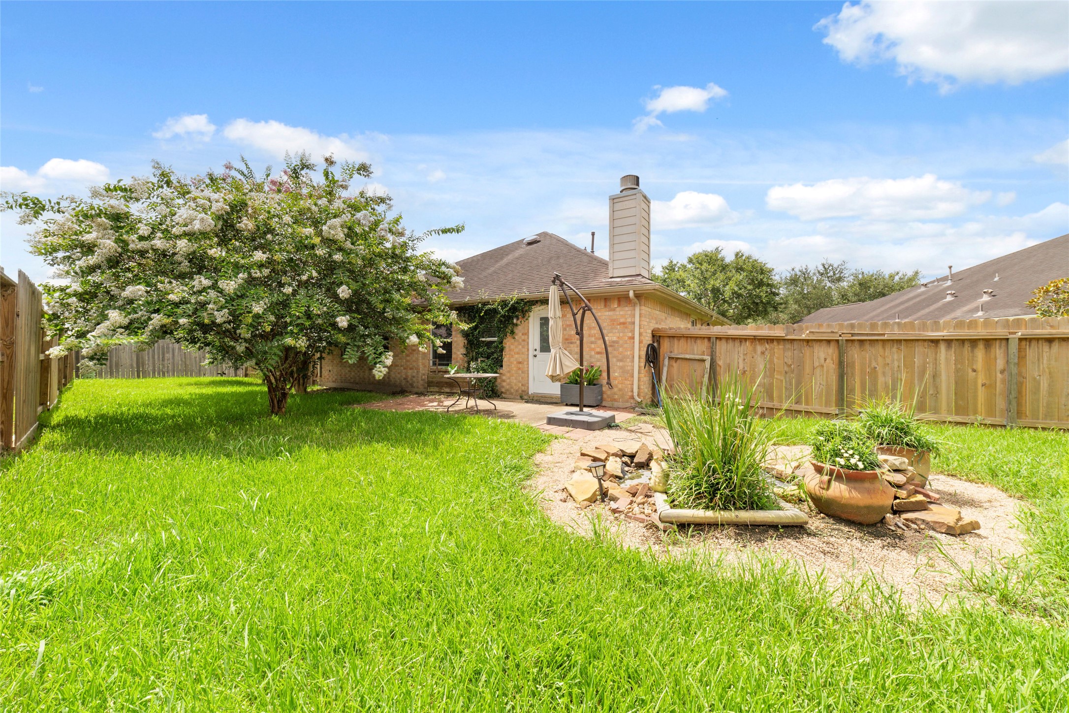 13605 Trail Meadow Lane Rosharon, TX 77583 - Photo 21 of 21 Patio with mature tree