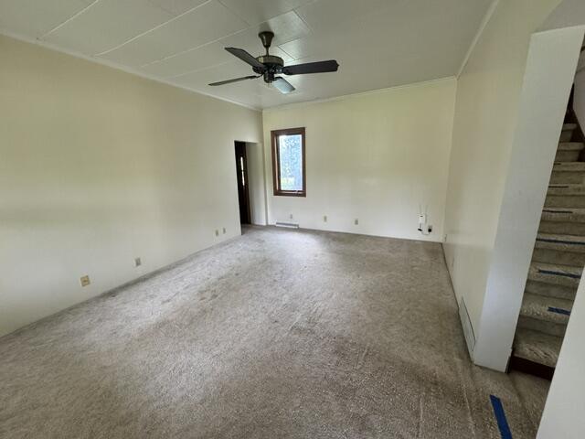 1001 Earl Road Michigan City, IN 46360 - Photo 16 of 24 an empty room with a ceiling fan and window