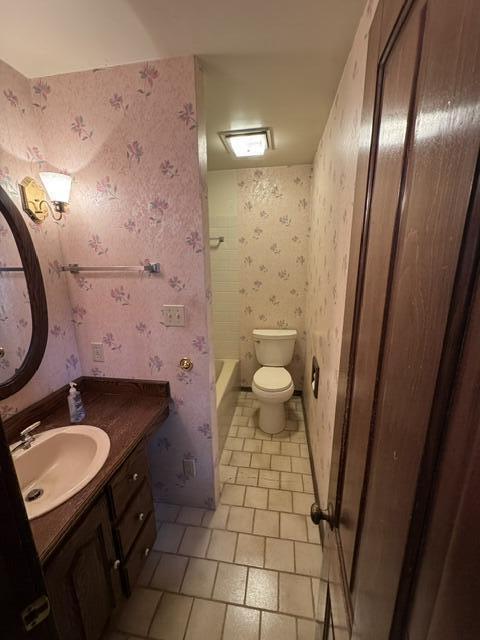 1001 Earl Road Michigan City, IN 46360 - Photo 20 of 24 a bathroom with a sink a toilet a mirror and vanity