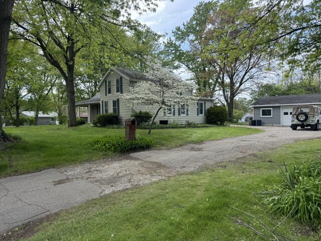 1001 Earl Road Michigan City, IN 46360 - Photo 2 of 24 a front view of a house with yard and green space