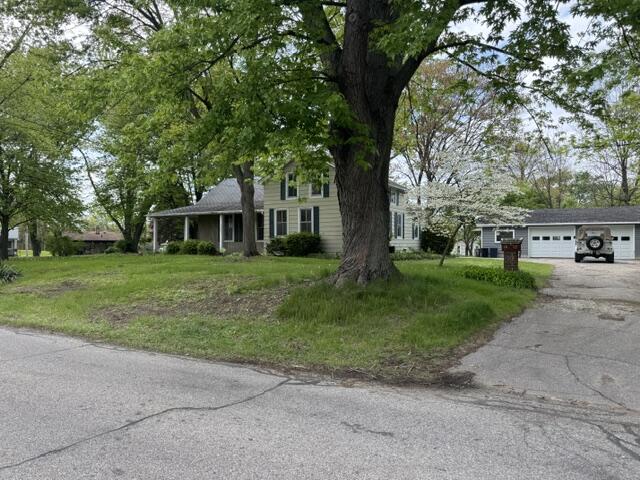 1001 Earl Road Michigan City, IN 46360 - Photo 3 of 24 a front view of a house with yard and green space