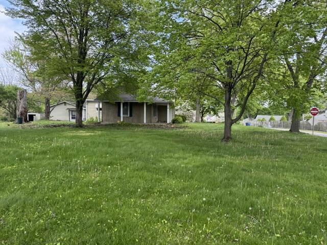 1001 Earl Road Michigan City, IN 46360 - Photo 6 of 24 a house view with a garden space