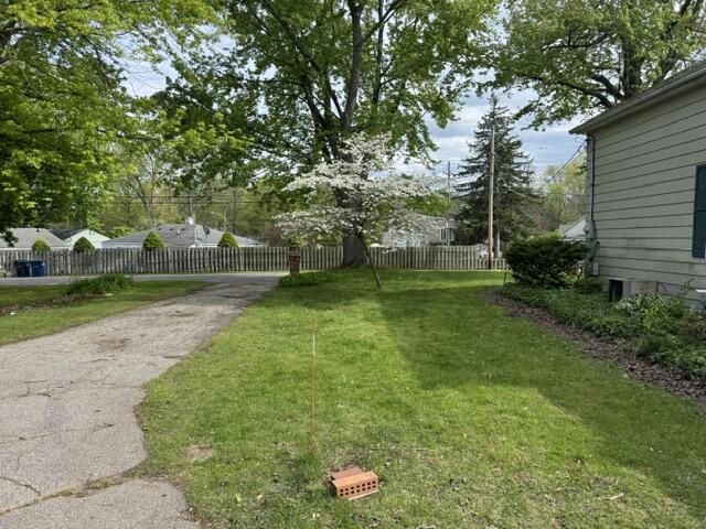 1001 Earl Road Michigan City, IN 46360 - Photo 9 of 24 a backyard of a house with lots of green space