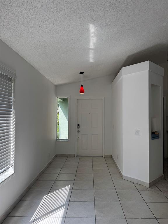4077 Pine Ridge Lane Weston, FL 33331 - Photo 15 of 25 a very nice looking room with a white walls