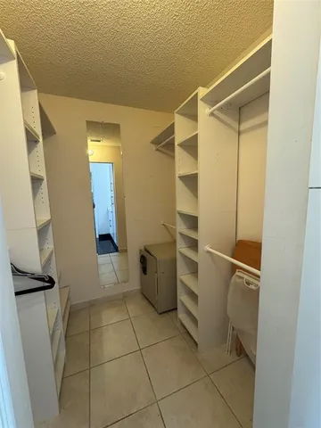 a bathroom with a shower and a toilet