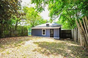 1154 Welch Street Southwest Atlanta, GA 30310 - Photo 7 of 7 a house with large trees in front of it