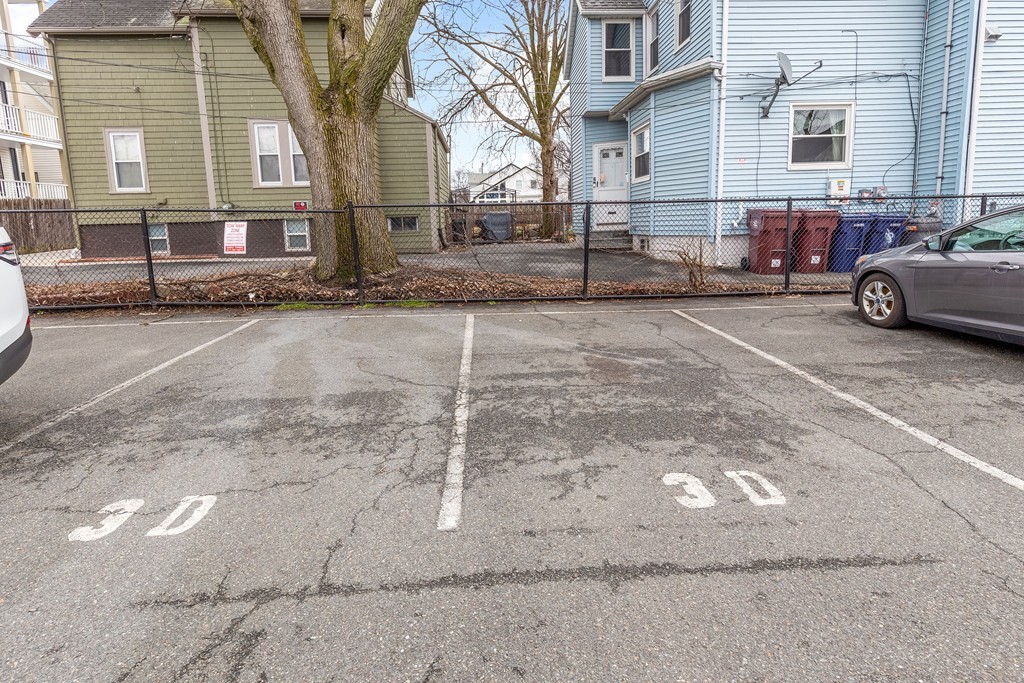 12 Locust Street, Unit 3D Everett, MA 02149 - Photo 24 of 24 a street view with a building