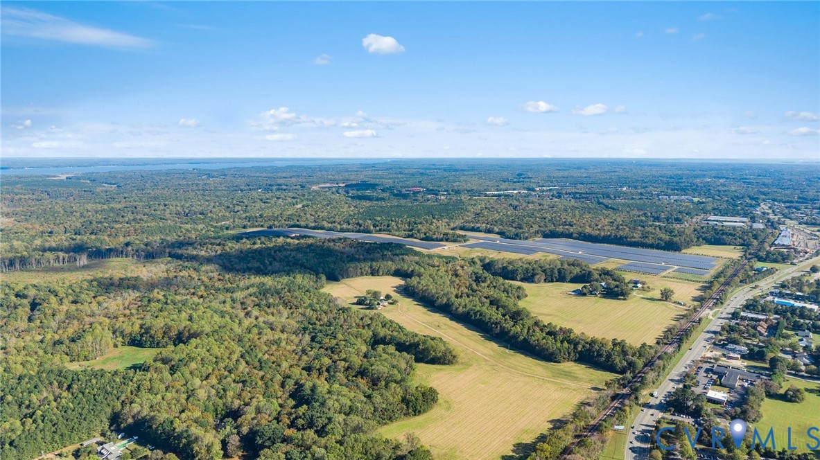 7436 Richmond Road Williamsburg, VA 23188 - Photo 14 of 44 an aerial view of residential houses with outdoor space and river