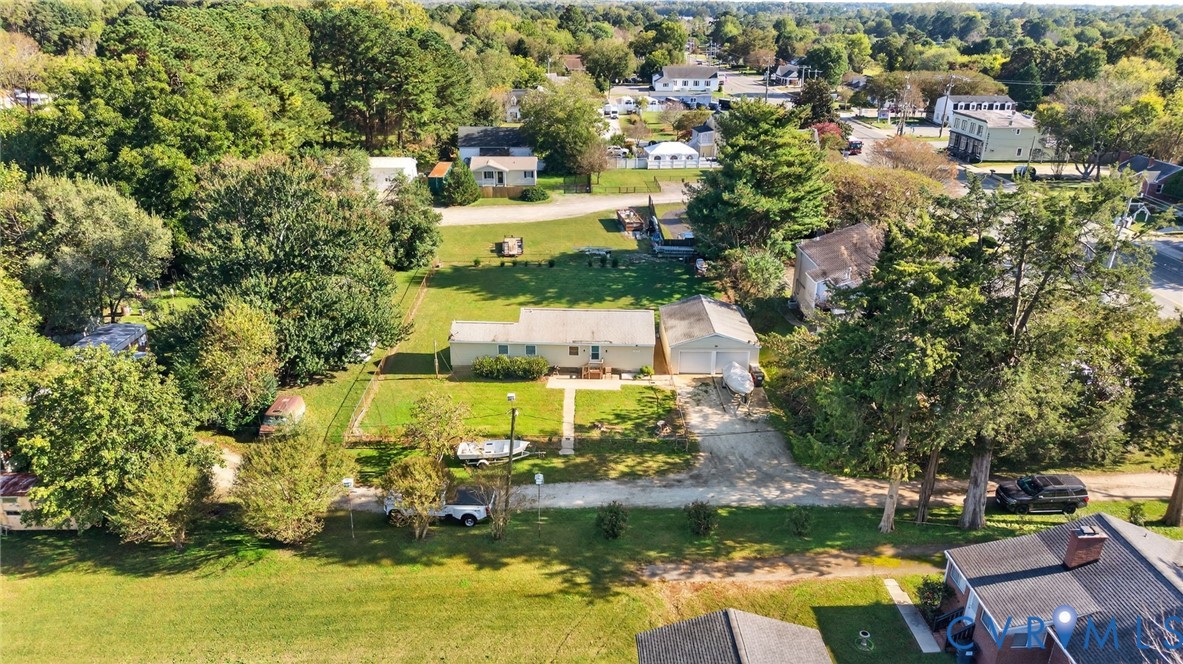 7436 Richmond Road Williamsburg, VA 23188 - Photo 6 of 44 a view of a lake with houses