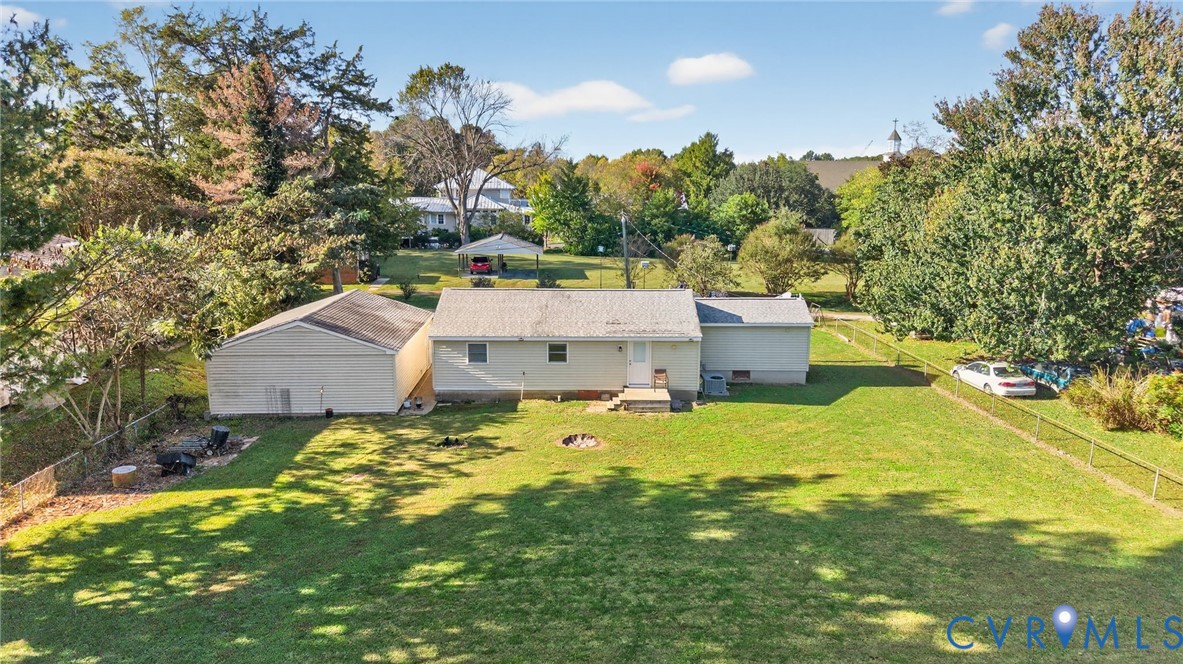 7436 Richmond Road Williamsburg, VA 23188 - Photo 8 of 44 an aerial view of a house with a yard basket ball court and outdoor seating