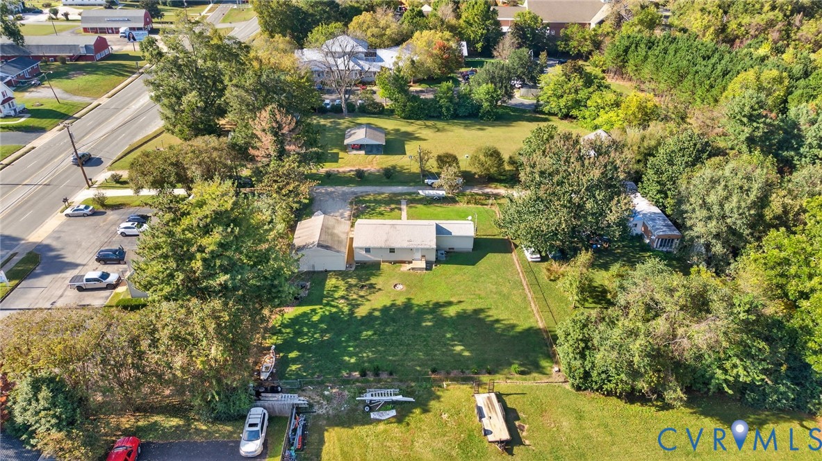 7436 Richmond Road Williamsburg, VA 23188 - Photo 10 of 44 a view of a lake with a building in the background