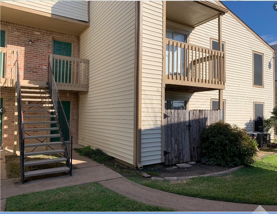 2200 Cypress Landing Road, Unit C12 Houston, TX 77090 - Photo 2 of 12 a view of a house with backyard and garden