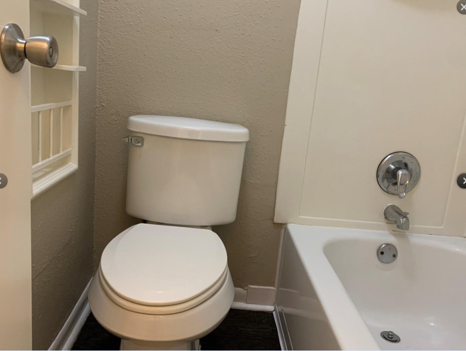 2200 Cypress Landing Road, Unit C12 Houston, TX 77090 - Photo 9 of 12 a white toilet sitting next to a bathroom sink