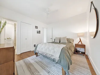 a view of a livingroom with furniture and windows