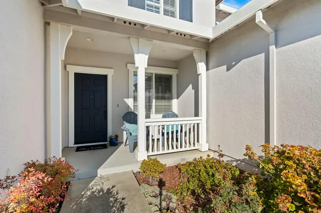 a view of a porch with a bench