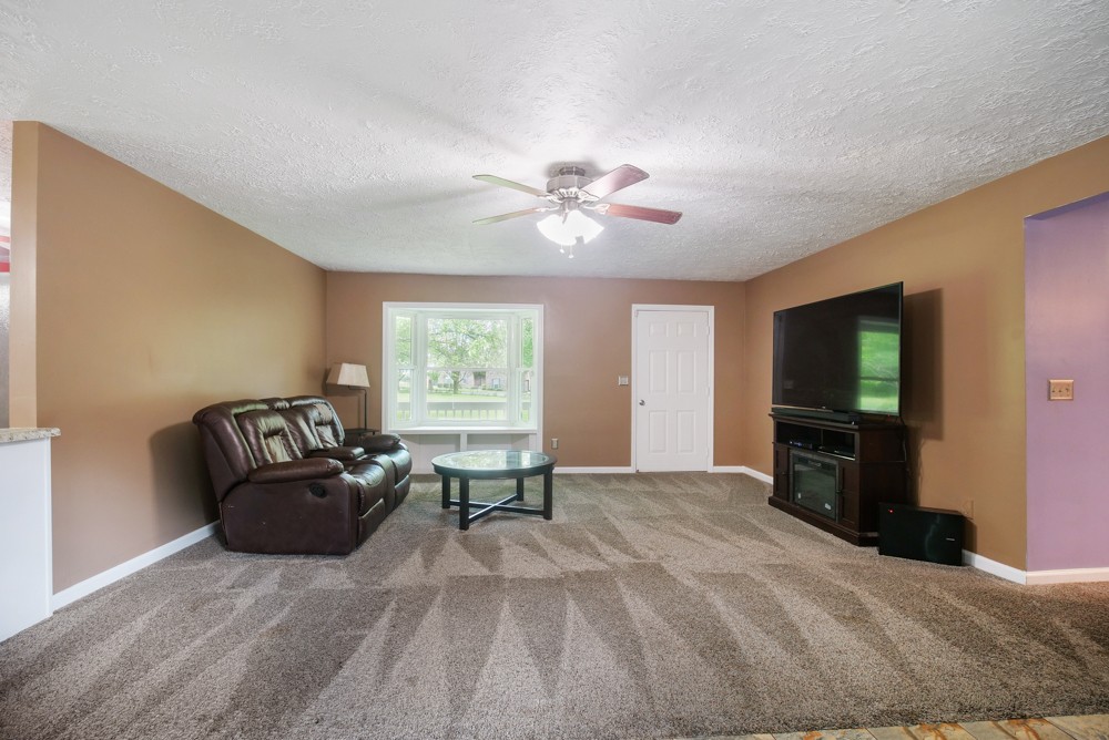 156 Vantrease Lane Gallatin, TN 37066 - Photo 14 of 37 a living room with furniture and a flat screen tv