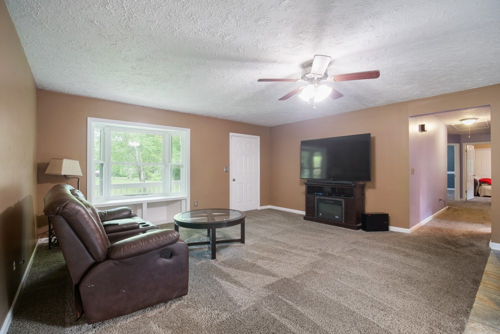 156 Vantrease Lane Gallatin, TN 37066 - Photo 15 of 37 a living room with furniture and a flat screen tv