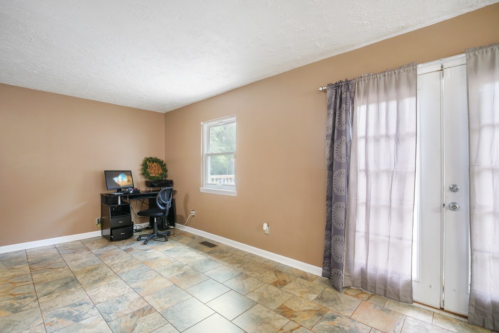 156 Vantrease Lane Gallatin, TN 37066 - Photo 18 of 37 a view of room with a window and a chair