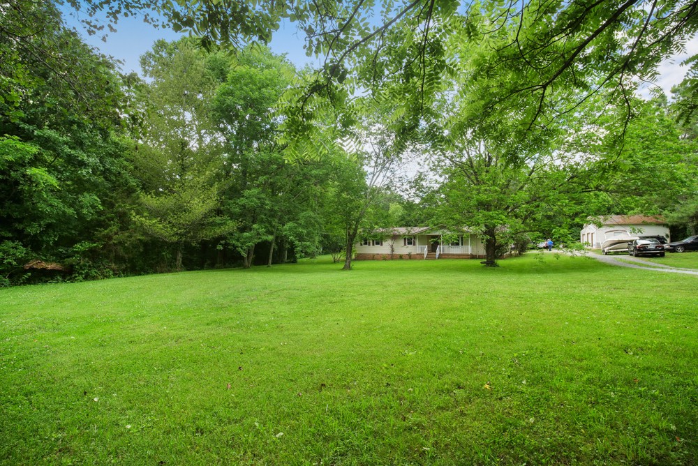 156 Vantrease Lane Gallatin, TN 37066 - Photo 3 of 37 a view of a park with trees and plants