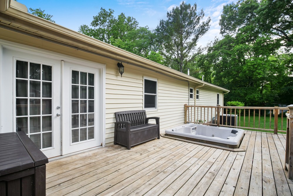 156 Vantrease Lane Gallatin, TN 37066 - Photo 26 of 37 a balcony with wooden floor and furniture