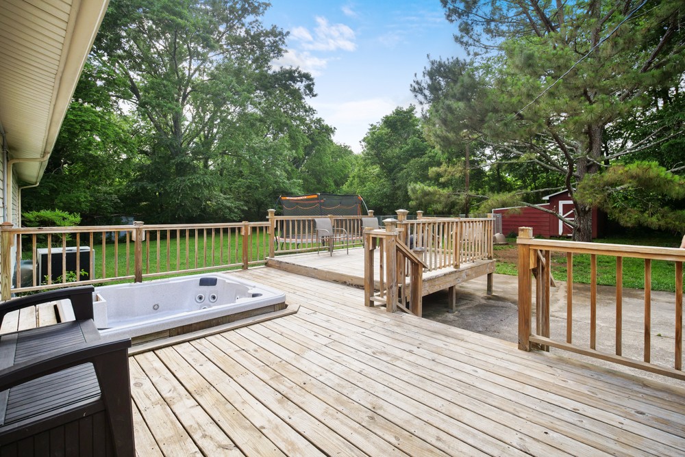 156 Vantrease Lane Gallatin, TN 37066 - Photo 27 of 37 a view of a deck with chairs wooden floor and fence