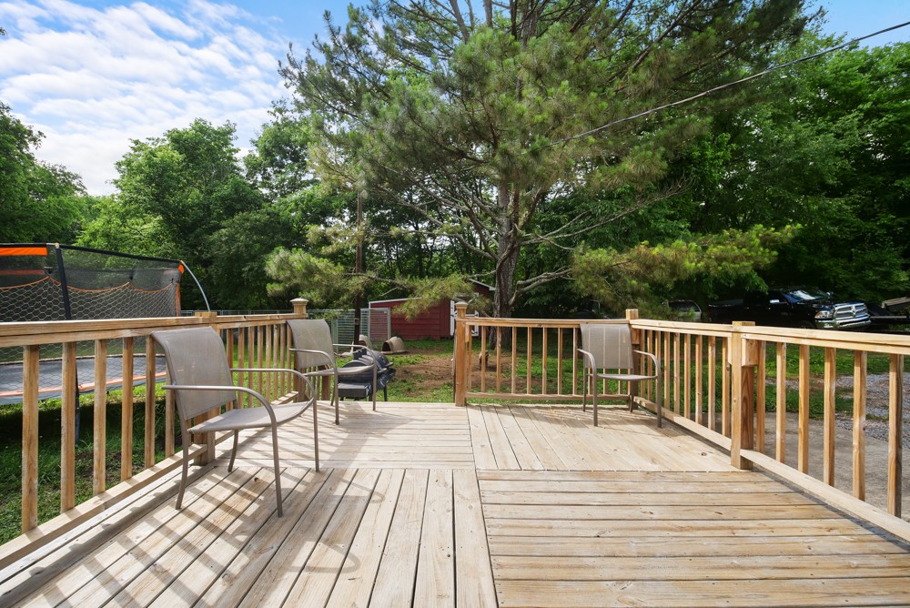 156 Vantrease Lane Gallatin, TN 37066 - Photo 28 of 37 a balcony with wooden floor and fence