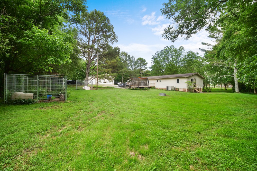 156 Vantrease Lane Gallatin, TN 37066 - Photo 33 of 37 a house view with a sitting space and garden