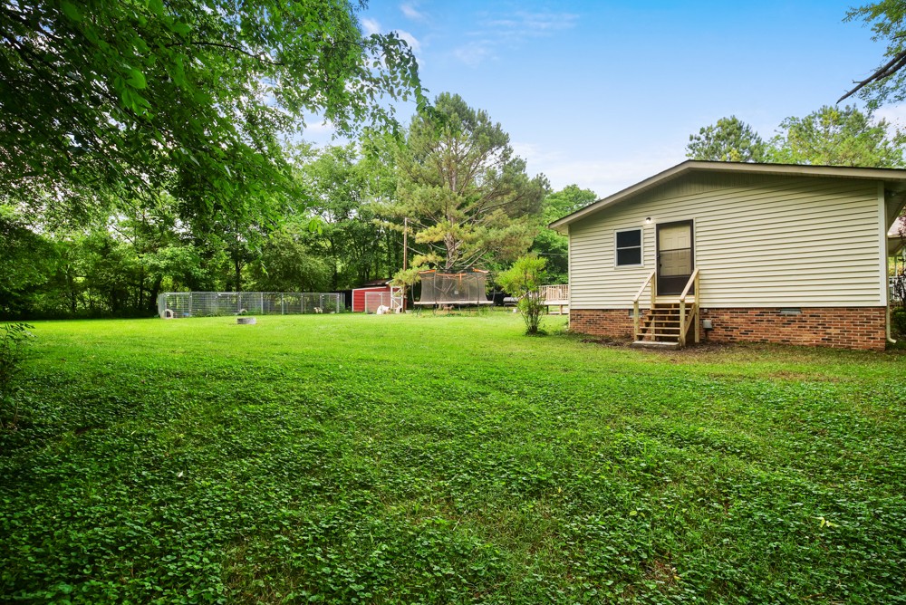 156 Vantrease Lane Gallatin, TN 37066 - Photo 34 of 37 a view of a backyard with a garden