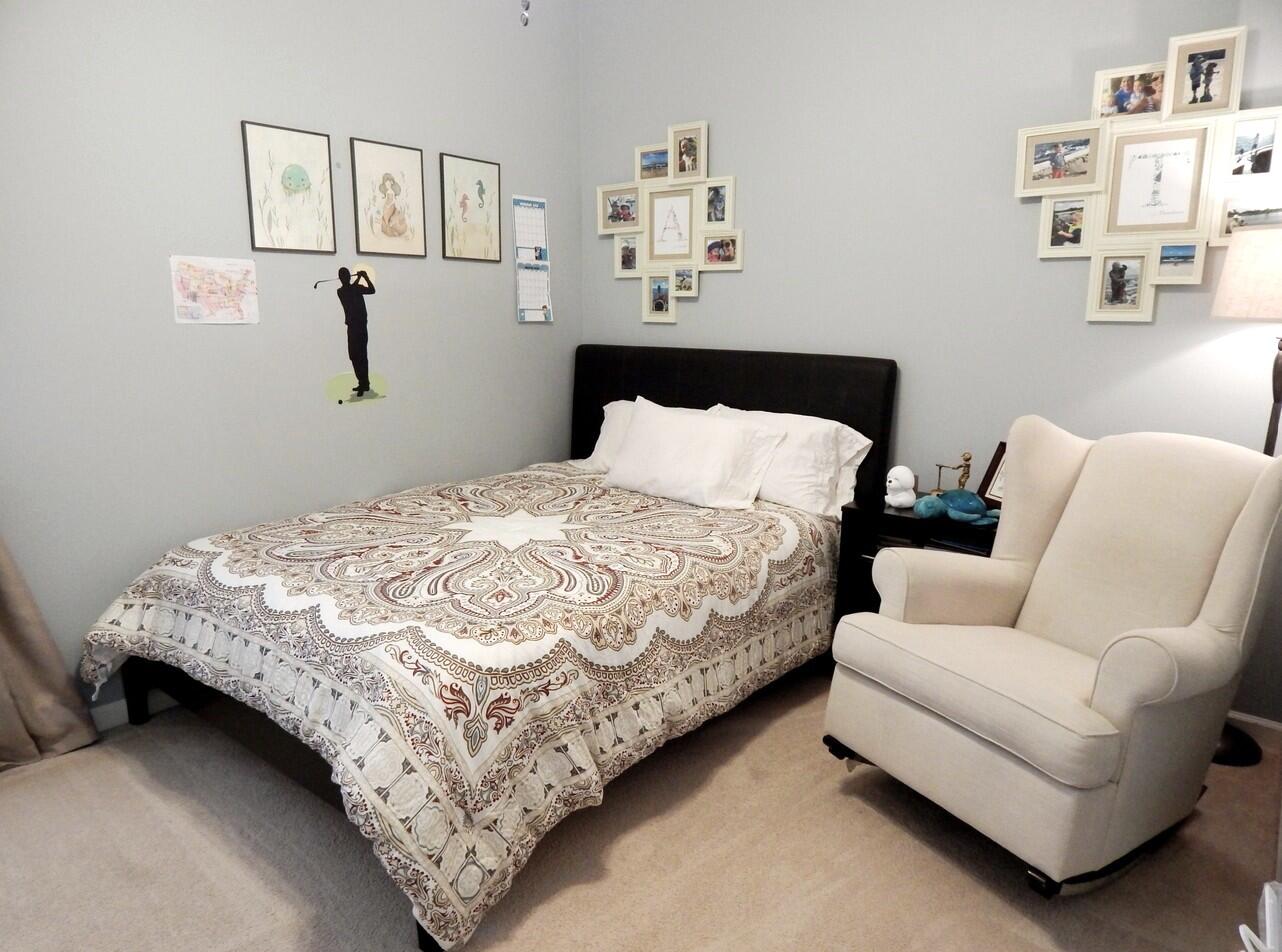 4820 Northwest 16th Terrace Boca Raton, FL 33431 - Photo 14 of 39 a bedroom with bed and furniture