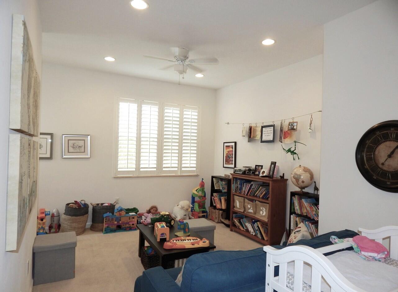 4820 Northwest 16th Terrace Boca Raton, FL 33431 - Photo 18 of 39 a living room with furniture and decor