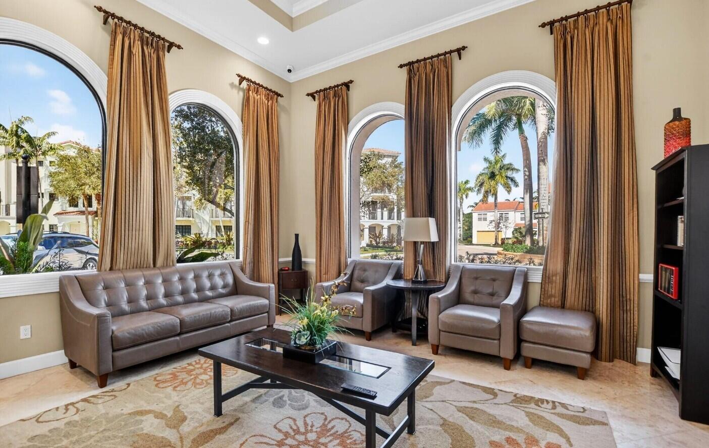 4820 Northwest 16th Terrace Boca Raton, FL 33431 - Photo 34 of 39 a living room with furniture and a large window