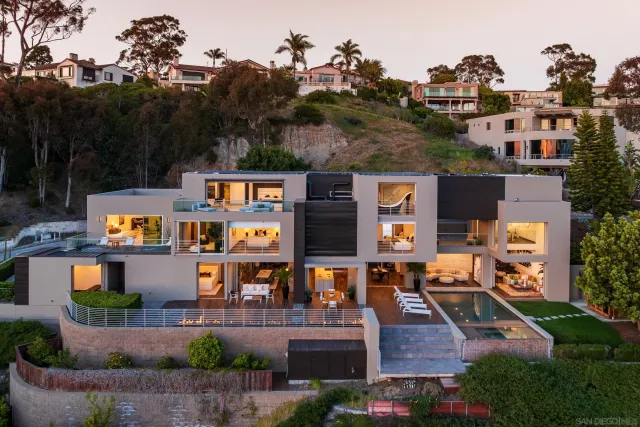 a view of a swimming pool with a lounge chairs