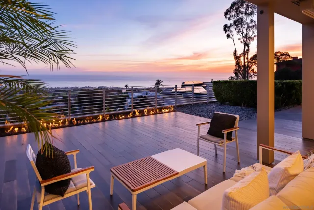 a view of a living room and dining room