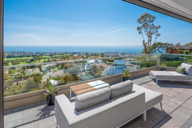 a workspace with furniture and bathroom