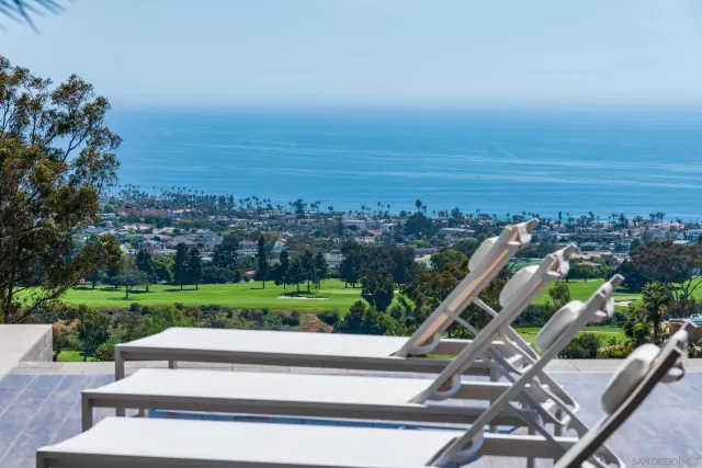 a view of a living room and dining room