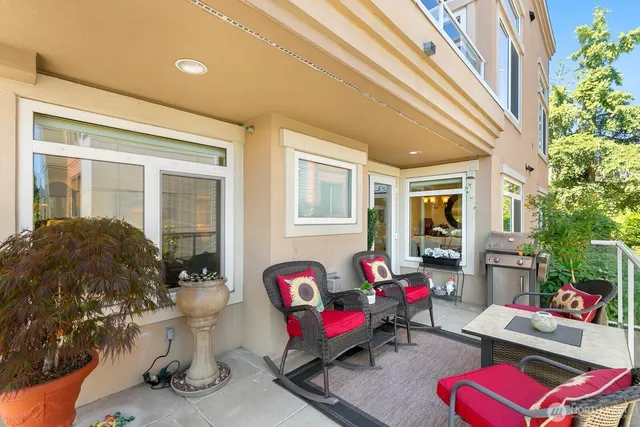 an aerial view of a house with a lake view