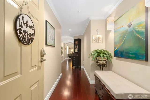 a living room with furniture large window and a fireplace