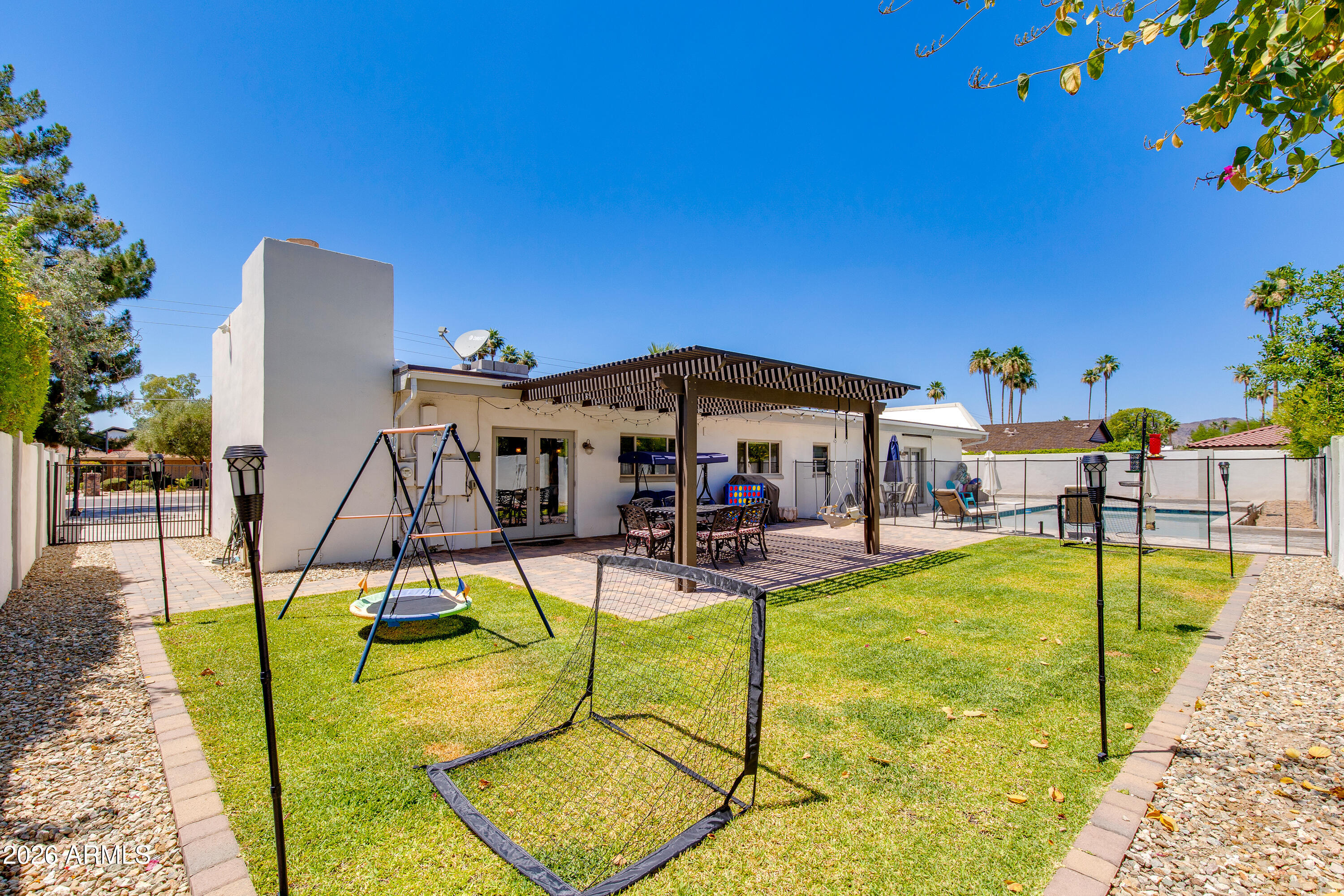 8219 North 3rd Avenue Phoenix, AZ 85021 - Photo 44 of 52 a view of a swimming pool with chairs