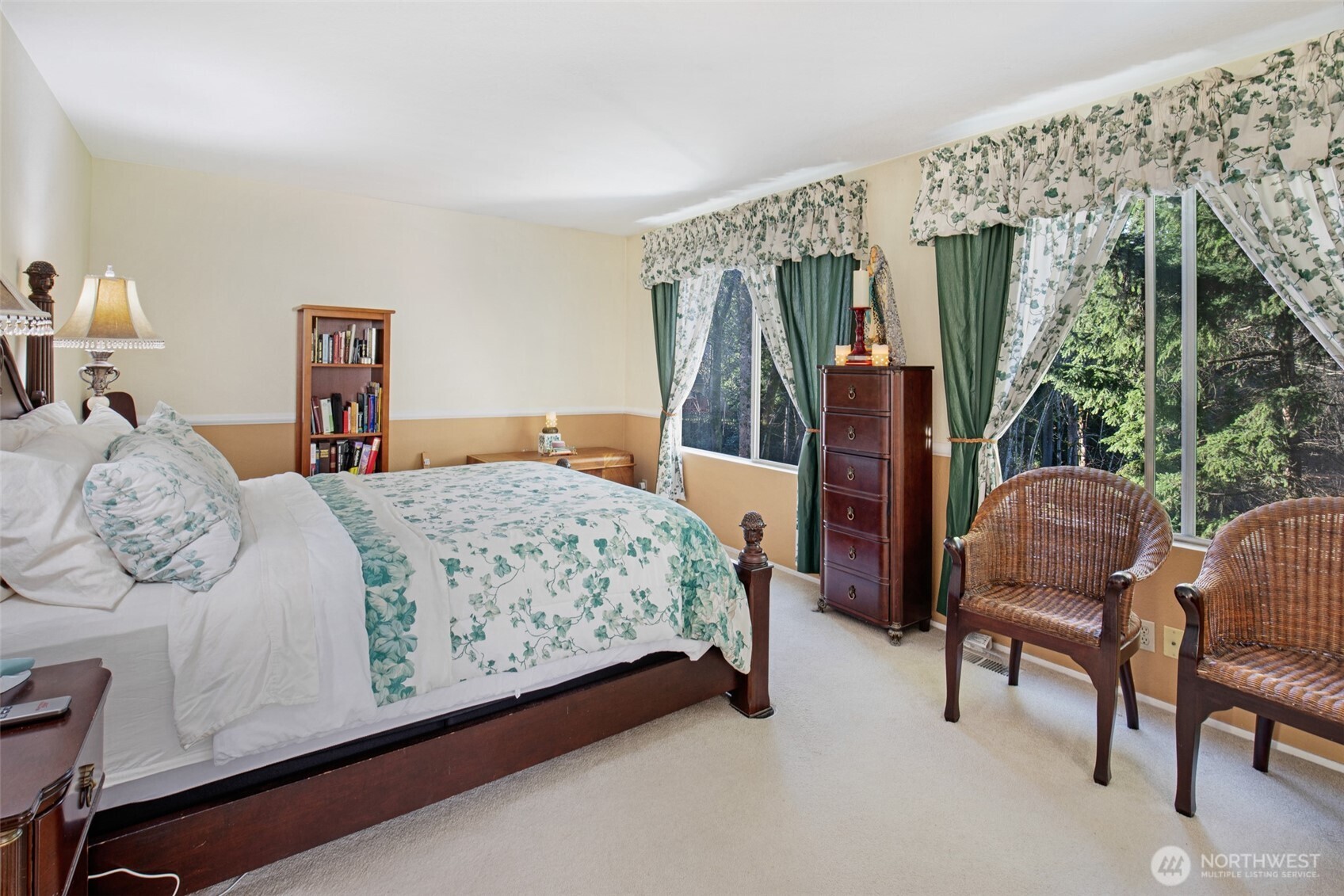 11908 Northeast 168th Street Bothell, WA 98011 - Photo 16 of 30 a bedroom with a bed chair and window
