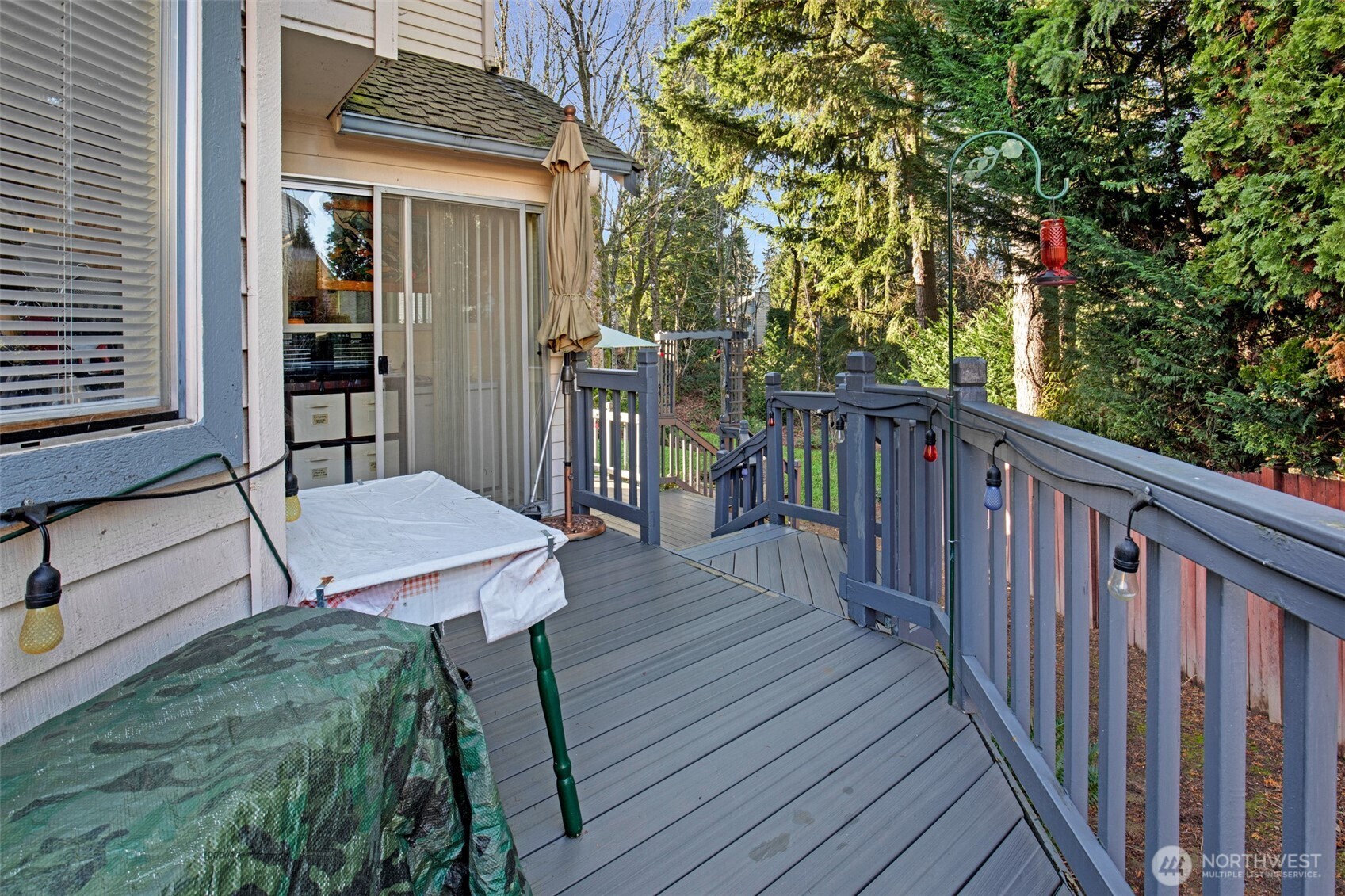 11908 Northeast 168th Street Bothell, WA 98011 - Photo 23 of 30 a view of a wooden deck and a backyard