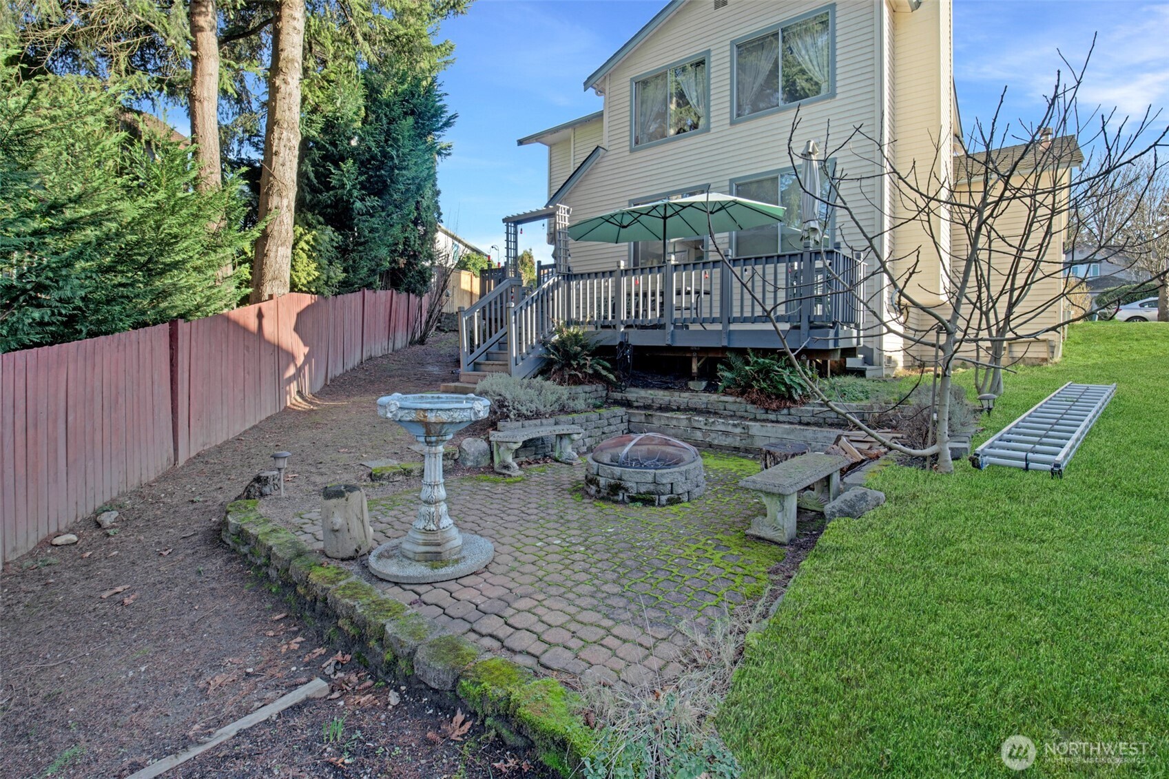 11908 Northeast 168th Street Bothell, WA 98011 - Photo 25 of 30 a view of a house with backyard and sitting area