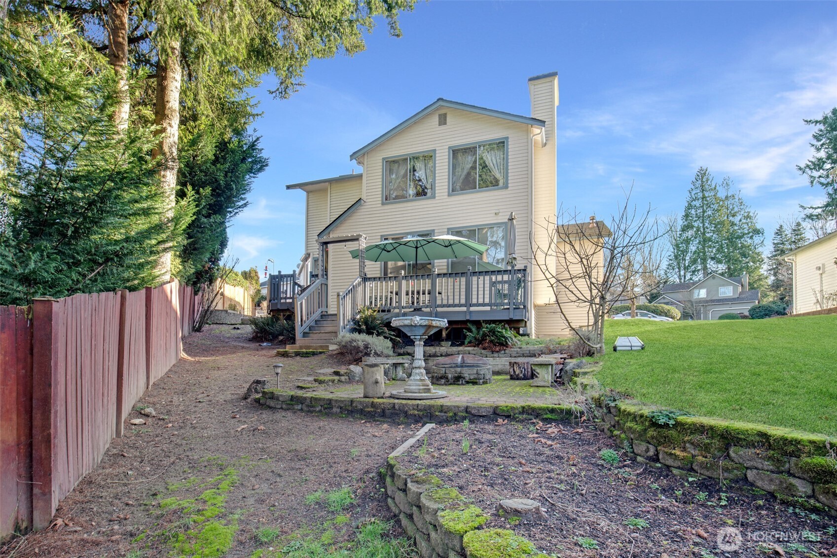 11908 Northeast 168th Street Bothell, WA 98011 - Photo 26 of 30 a front view of a house with garden